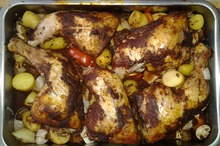 Copane de pui pe pat de legume